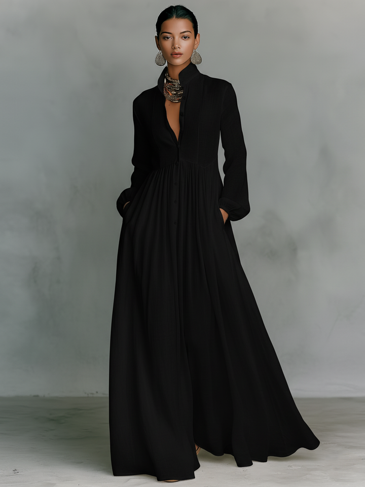 Sixth image: Patchwork linen maxi dress with stand collar, detail of fabric texture and relaxed fit.