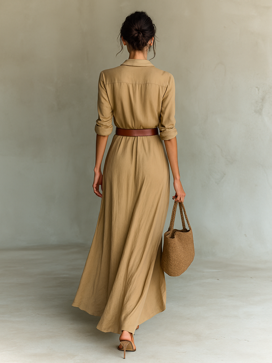 Elegant black maxi dress with long sleeves and revers collar, flowing fabric, product image 4 of 7.